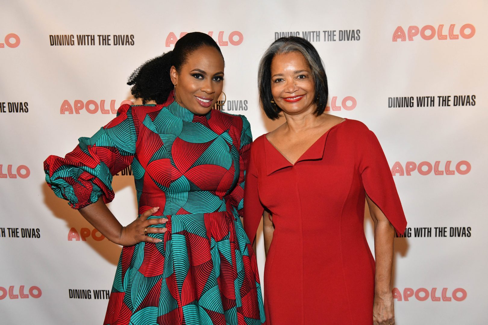 Jonelle Procope and Kamilah Forbes posing next to each other at an Apollo fundraiser